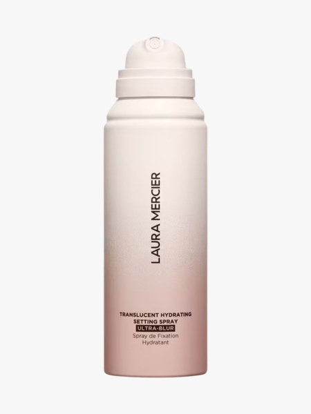 Spray bottle of Laura Mercier Translucent Hydrating Setting Spray with cream-colored top on light gray background