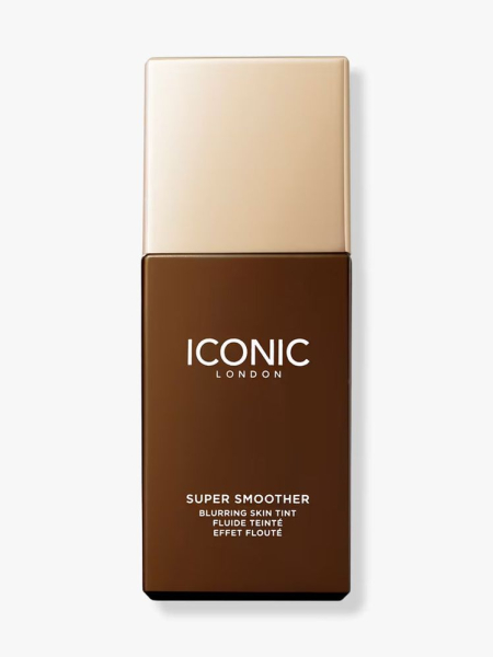 Photo of Iconic London Super Smoother Blurring Skin Tint in the shade Golden Rich on a light gray background