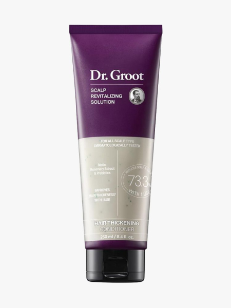 Dr. Groot Hair Thickening Conditioner in branded tube component on a light gray background